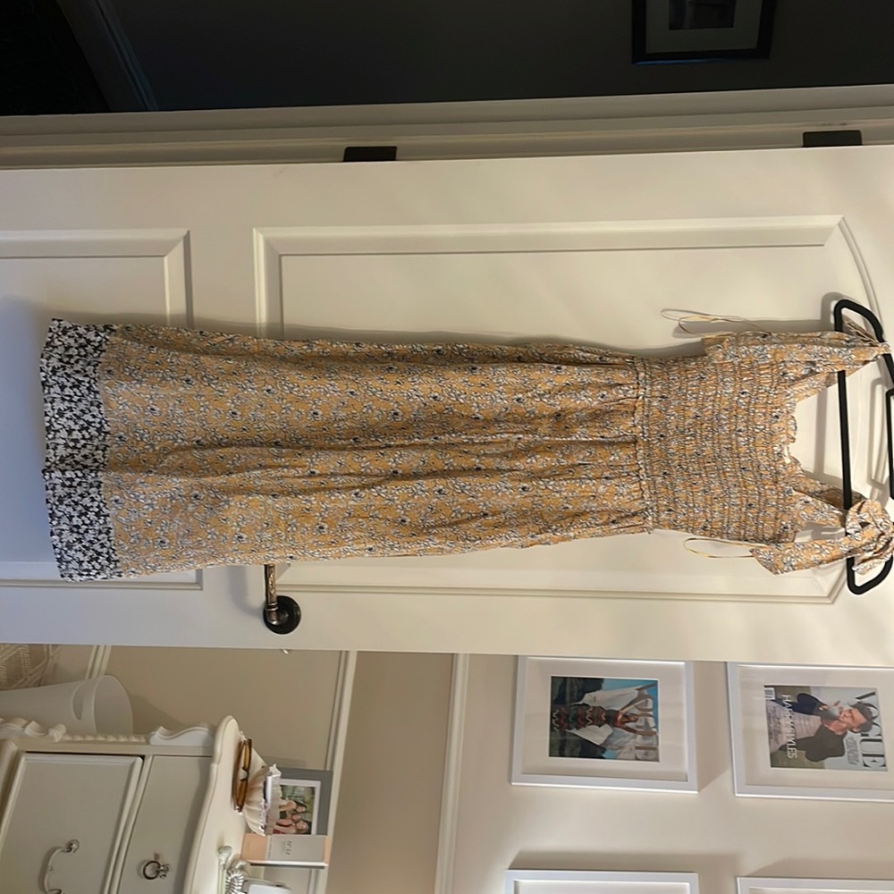 Brand new maxi floral print dress. Bow tie straps.